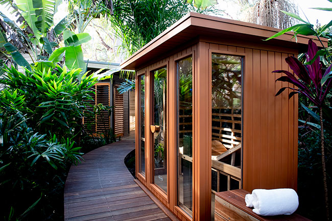 Timber pathway welcomes you to the serene sanctuary of Cloud 9 Sauna