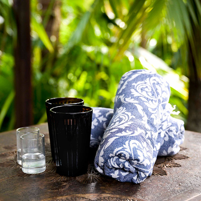 Towels and fresh water on bench at Cloud 9 Sauna